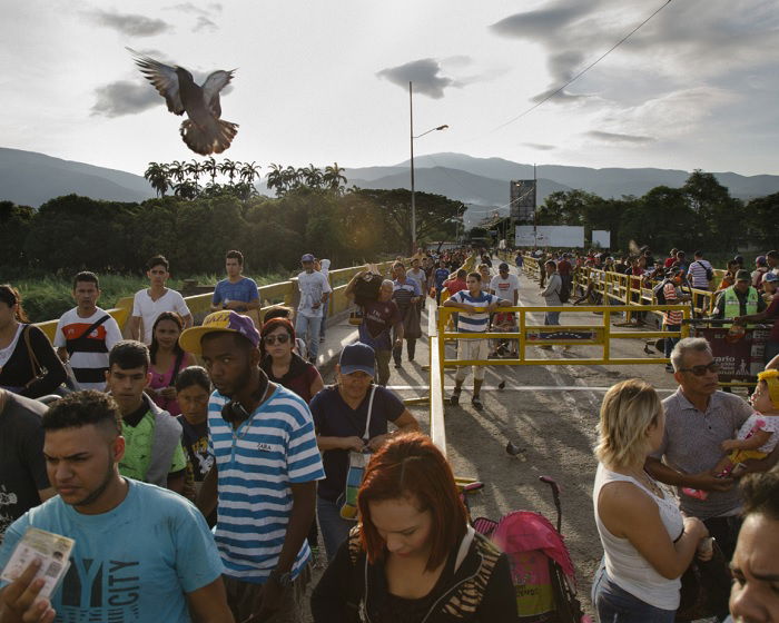 Crowd of people walking together