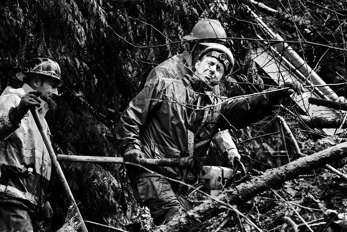 Firefighters on a rescue mission in the woods