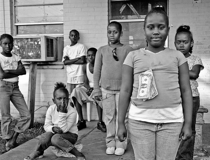 Group portrait of children on a porch