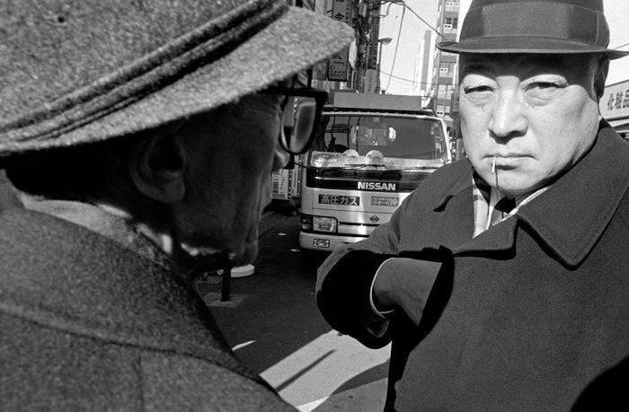 Suspicious japanese man looking at the camera